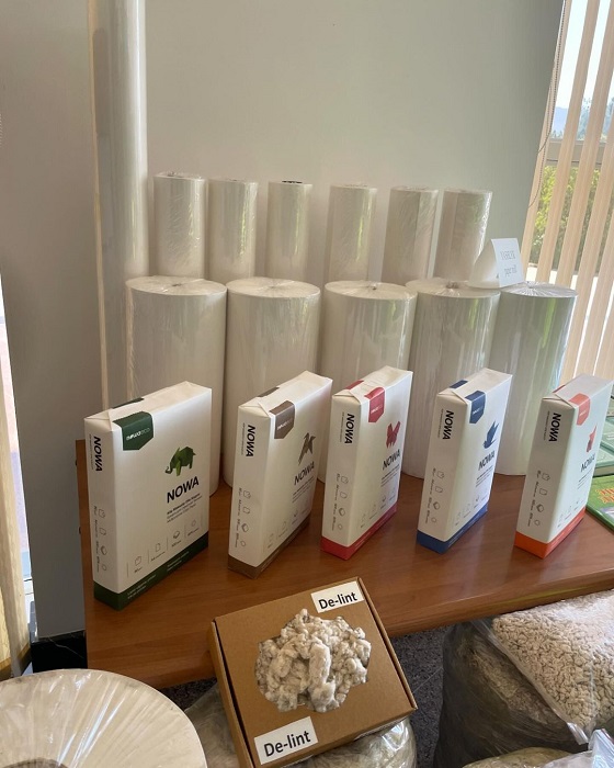 Nowaeco office paper, paper rolls and cotton raw material on display